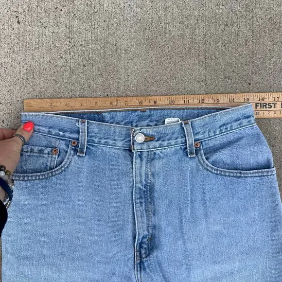Vintage 90s Levi's 550 Relaxed Fit Tapered Leg Light Blue Jeans Size 12 Reg M
